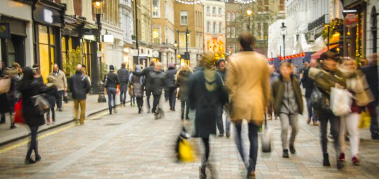 shoppers walking in town centre 