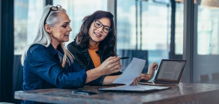 businesswomen at table 