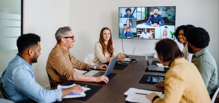 Teams meeting taking place in a meeting room