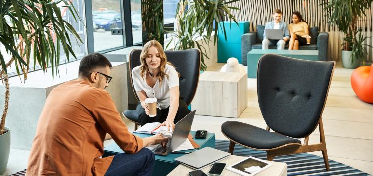 Team members meeting to discuss innovation