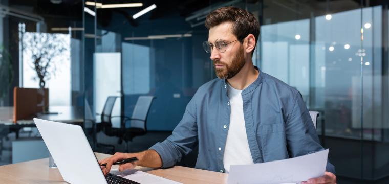 A man working at his laptop