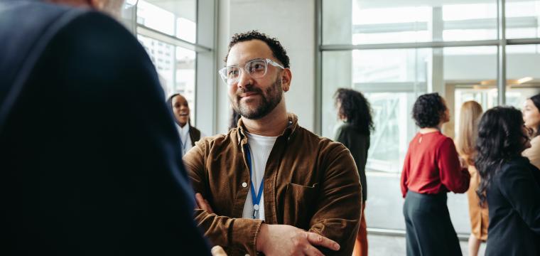 People chatting at a networking event