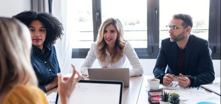 People talking at a business meeting