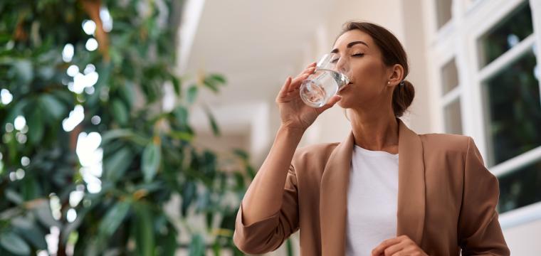 Woman drinking a glass of water
