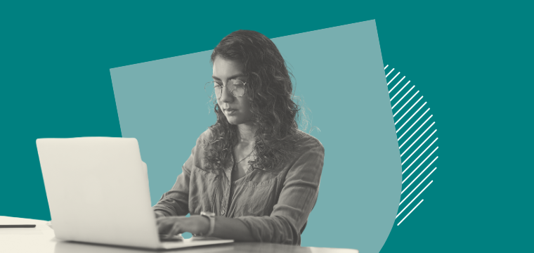 A woman working at a laptop