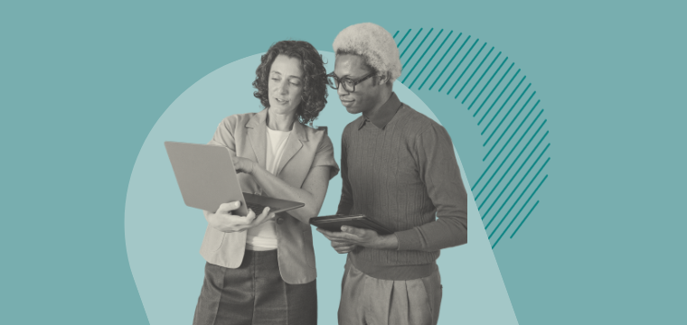 Two people reviewing a laptop