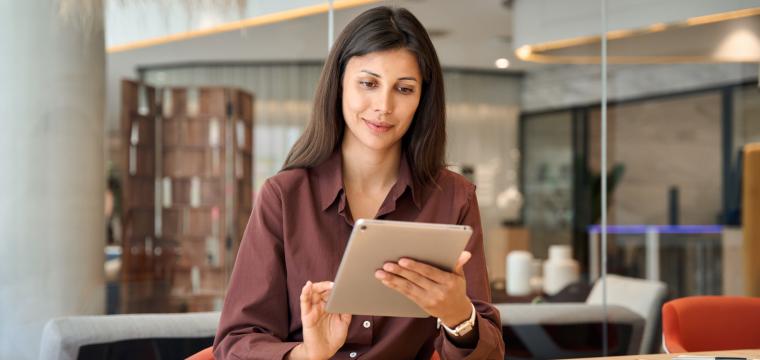 A woman working on a tablet