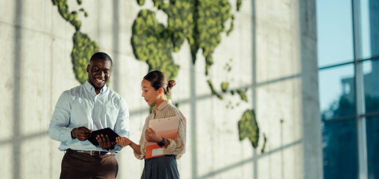 Two people discussing business