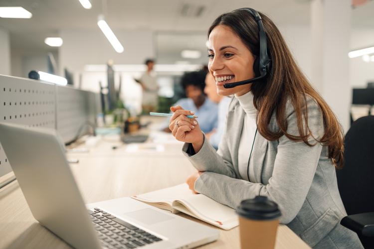 Woman taking a call in the office