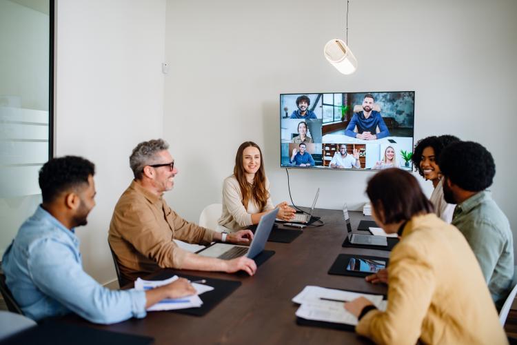 Teams meeting taking place in a meeting room