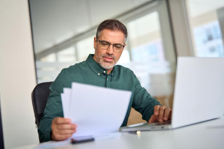 A man reading some documents