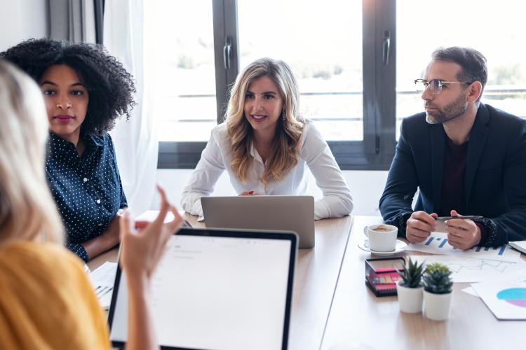 People talking at a business meeting