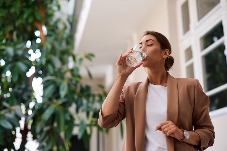 Woman drinking a glass of water