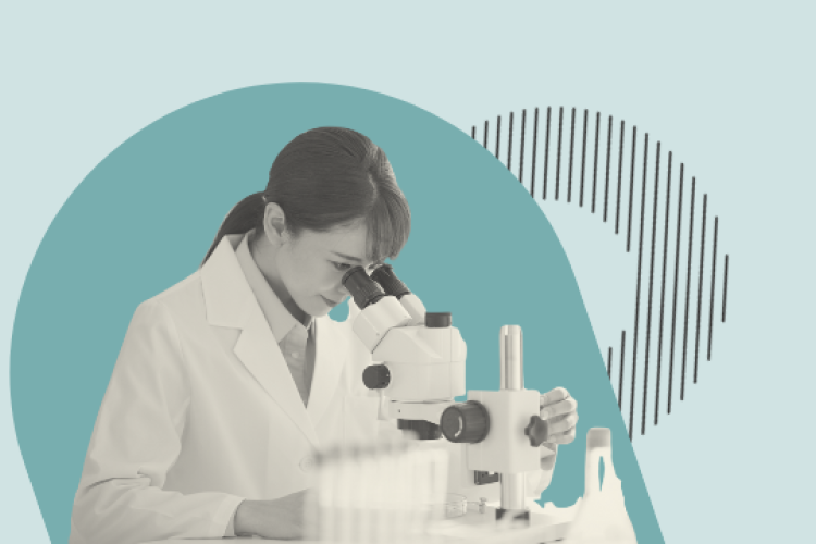 A woman using a microscope