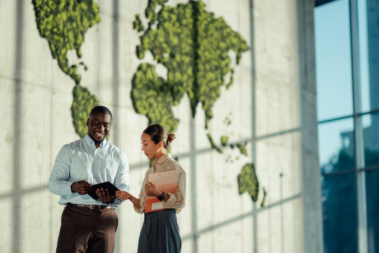 Two people discussing business