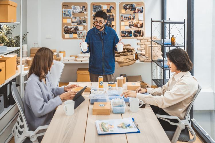 Three people discussing net zero